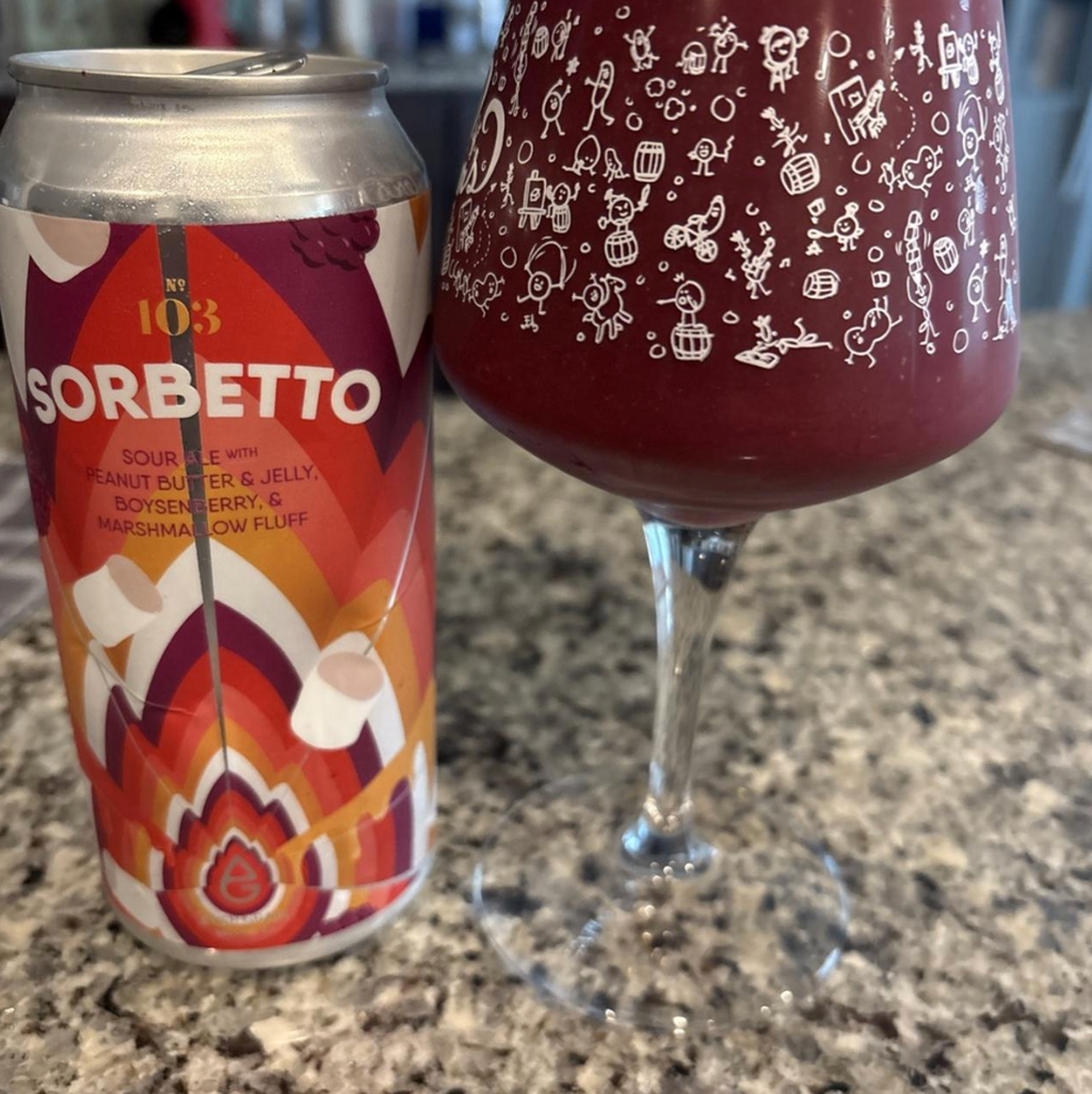 Ever Grain Brewing Co. – Sorbetto #103

ABV: 6 % | Stil: Smoothie Pastry Sour | Untappd: 4,23

Sorbetto #103 er endnu en vild udgave i Ever Grains populære Sorbetto-serie. Her har bryggeriet taget inspiration fra den klassiske PB&amp;J-sandwich og kombineret peanutbutter, boysenbærgelé, mælkesukker og skumfidus i en fyldig smoothie sour. Resultatet er en nostalgisk, cremet og overraskende velbalanceret frugtøl, hvor dessert og syrlighed mødes i perfekt harmoni.
