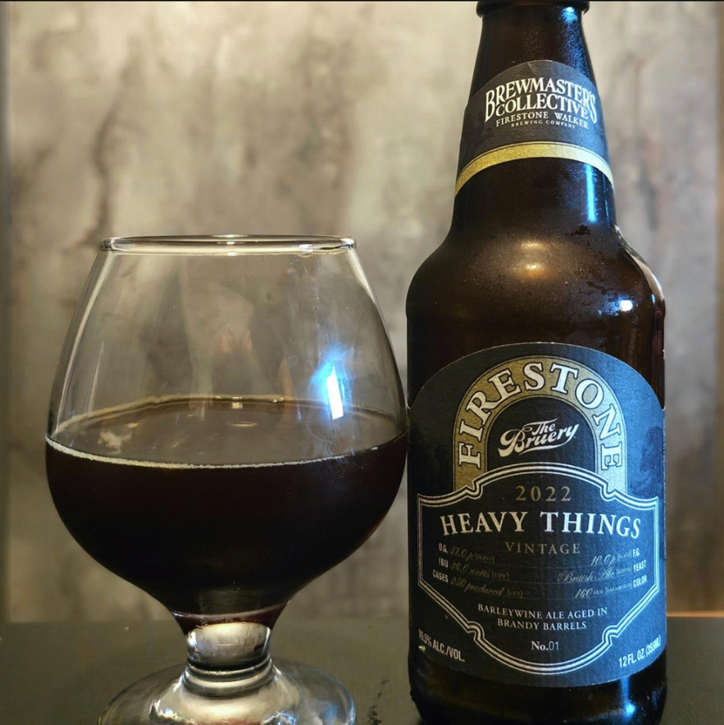 Firestone Walker x The Bruery – Heavy Things (2022)

ABV: 16,5 % | Stil: Barrel Aged American Barleywine | Untappd: 4,33

Et samarbejde mellem Firestone Walker og The Bruery, skabt som en del af Firestone Walkers eksklusive Brewmaster's Collective-serie. Heavy Things er en voldsom barleywine, som er medgæret med ahornsirup og efterfølgende lagret 8 måneder på brandyfade. Resultatet er en enormt kompleks og dessertagtig øl med masser af dybde og varme.