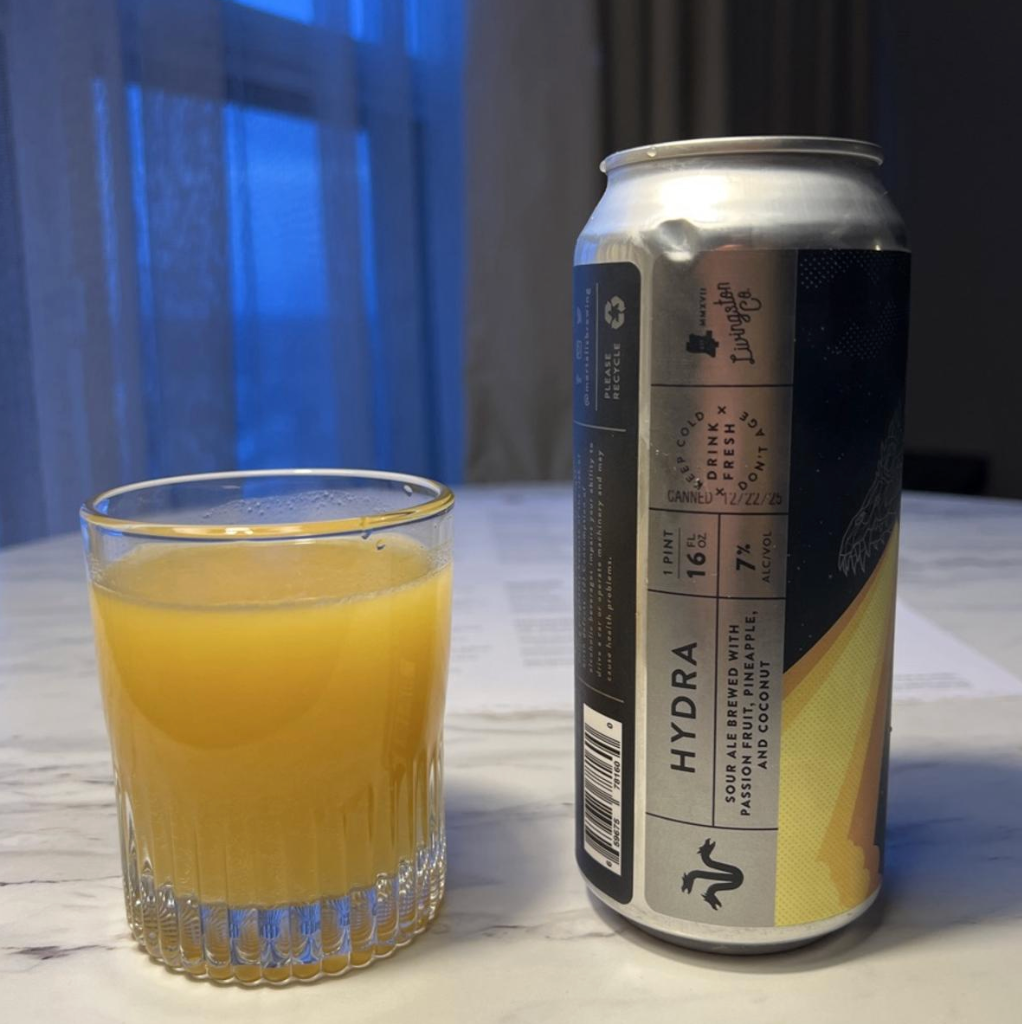 Mortalis Brewing Company – Hydra: Passion Fruit + Pineapple + Coconut
ABV: 7,0 % | Stil: Smoothie / Pastry Sour | Untappd: 4,35

En tropisk og fyldig smoothie sour fra Mortalis’ Hydra-serie. Øllen er brygget med passionsfrugt, ananas og kokos, som giver en intens frugtprofil med både frisk syrlighed og blød, dessertagtig fylde.